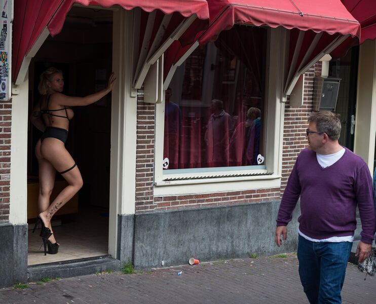 File:Prostitute in doorway, Amsterdam.jpg